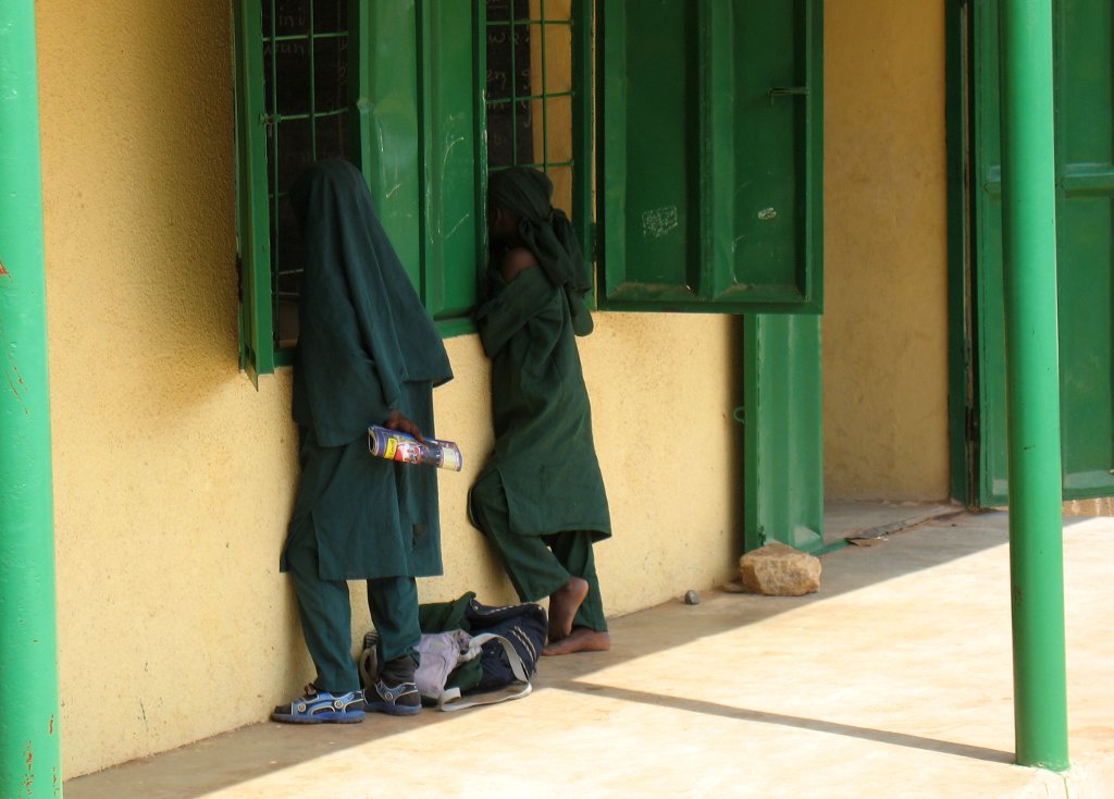 Girls looking in